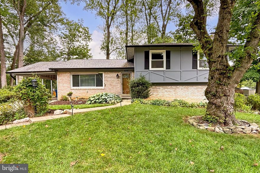 Open House 12-3 Saturday 8/24 and Sunday 8/25. Very rarely available 4-level Mulberry model perfectly situated on a 0.27 acre cul-de-sac lot! This beautifully updated split-level home features 5 bedrooms and 2.5 baths. You'll fall in love with the gorgeous kitchen, updated in 2021/2022, which boasts an abundance of shaker style cabinets with soft-close drawers, pull-out shelves, and 3 pantries. Additional features include quartz counters, a marble tile backsplash, recessed lighting, and quality stainless steel appliances, including a flat-top range and French door refrigerator. The large breakfast area, brightened by a picture window, is perfect for the whole family. The main and upper levels feature gleaming hardwood floors, and the entire interior has just been freshly painted. The large living room picture window overlooks the 4-season sunroom, which is brightened by walls of windows and skylights and accessed through sliding glass doors in the dining room or 2 exterior sliding doors. Upstairs, you'll find 4 spacious bedrooms (3 with ceiling fans) with abundant closet space (2 with Elfa systems) and an updated hall bath. The primary bedroom boasts a brand-new tile shower enclosure in the en-suite bath and a large walk-in closet as well as a new lighted ceiling fan. Down a half flight from the main level is a large family room with a wood-burning fireplace and vinyl tile flooring, the 5th bedroom, and a half bath. There's also a storage/utility/laundry room with a side door walkout to the yard. Storage is plentiful in this home, with a huge unfinished sub-basement/bonus 4th level that includes a workbench and extra shelving, offering future possibilities for additional living space. The recently painted exterior shines, complemented by beautiful landscaping that enhances curb appeal. You'll be amazed by the bright pops of azalea colors in the spring. The fenced rear yard (minus gates) features a new ground-level sundeck, two sheds (one partially a greenhouse), a large carport, and a long driveway for ample parking. Other recent updates include a new roof (2020), gutters (2022), HVAC (2016), energy-star exterior doors (2021), a 50-gallon water heater (2021), radon remediation (2022), and front-load washer/dryer (2023). Enjoy exercise on the nearby “Accotink Stream Valley” portion of the 40-mile-long Cross-County Trail leading to Lake Accotink. This home is in a super convenient location, close to major commuter routes and minutes from the Franconia/Springfield Blue Line Metro and the Rolling Road or Springfield Virginia Railway Express. It's 14 miles to the Pentagon (with an Express bus stop around the corner), 8 miles to Fort Belvoir, and 4 miles to the National Geospatial-Intelligence Agency. Shopping and dining options abound, including the Springfield Town Center, Mike’s American Grill, Whole Foods, Trader Joe’s, and a gourmet Giant. All of this is within the top-rated Keene Mill ES, Irving MS, and West Springfield HS pyramid (with recently renovated elementary and high schools). You will love living here!