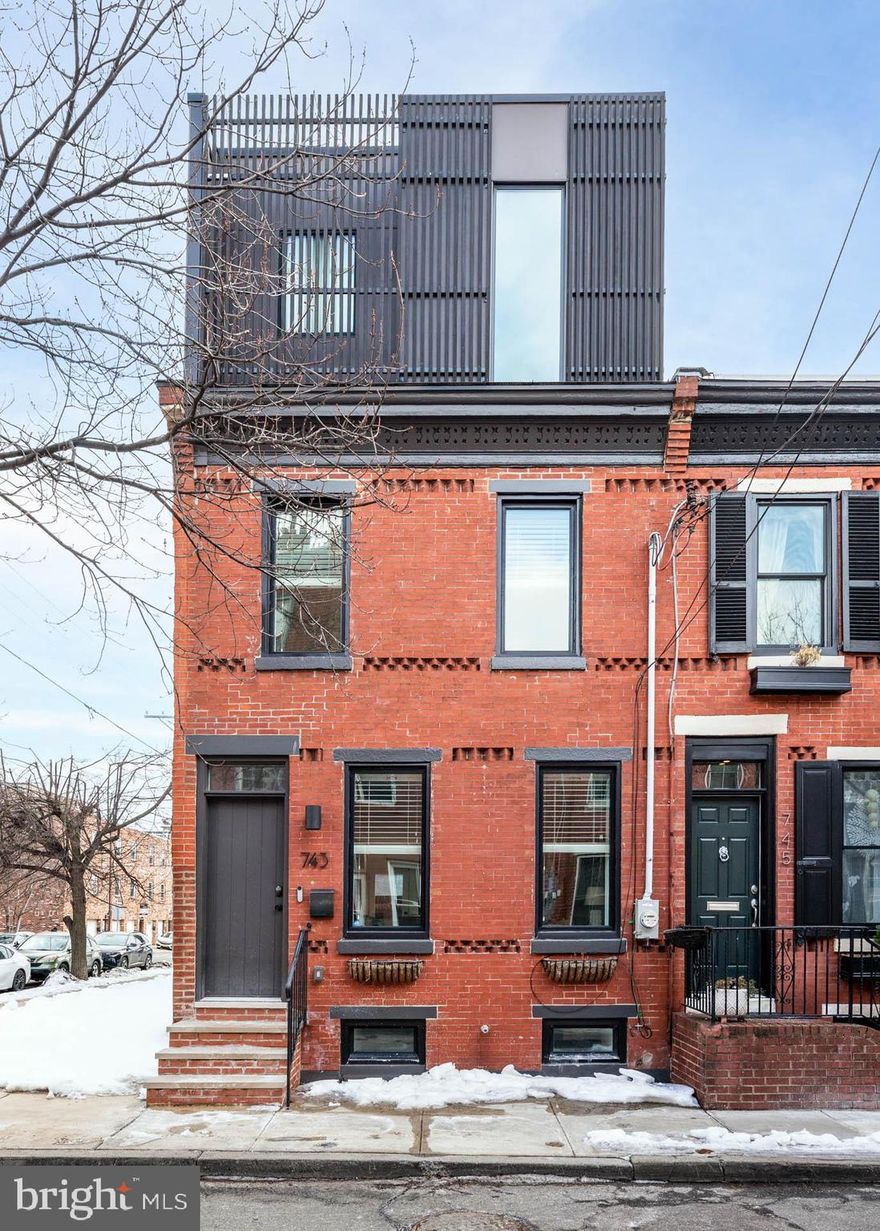 Step inside this thoughtfully crafted home at 743 S Cleveland and find your entertainer's paradise in the heart of Graduate Hospital. Painstakingly restored in 2022, this residence features a third-floor addition and an unbelievable roof deck with stunning, fully unobstructed city skyline views. The home speaks volumes through its exquisite details, including white-washed brick walls, a hand-crafted oak railing, and natural wood wide-plank flooring. The large chef's kitchen is a market standout with its sleek design, stainless appliances, ample storage, and a large island. This open-concept space flows effortlessly into the dining and living areas with soaring ceilings. The second floor offers two sunny, spacious bedrooms, a large tile hall bathroom, and dedicated laundry. Retreat to the primary level, which boasts a spacious suite with marble bath, complete with a skylit shower, dual vanities, and a soaking tub. A fully finished lower level with full bath finishes this fabulous townhome. This home is not to be missed!