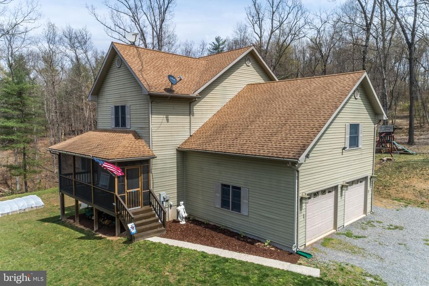 Here's a well-maintained move-in ready home on 3 private wooded acres with a small stream on the property.  This 3 bedroom 2 1/2 bath contemporary home has been meticulously well cared for and is ready for you to call it home.  All three bedrooms are immaculate with ample closet space.  Master suite has large sitting room, walk in closet and gigantic bathroom with separate jetted soaking tub and shower and double vanity.  Spacious main level offers separate dining room, large kitchen with island, sun room/office, family room and living room with gas fireplace.  2" faux window shades convey.  Anderson double hung tilt windows throughout home.  Oversized two car attached garage and unfinished basement for extra storage.  Newly installed Lennox HVAC system, newly constructed back deck, new water softener and filtration system.  Enjoy the peaceful countryside from your screened in front porch.  House comes with a 1 year Home Warranty!