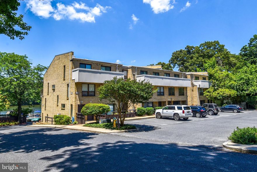 Experience the luxury of waterfront living in this studio condo. This unit is the perfect combination of a quiet, private, and serene setting, all within blocks of West Annapolis restaurants and shopping, City Dock/Downtown Annapolis, and the Naval Academy/Navy Stadium. Sip coffee from your waterfront, poolside balcony and watch the boats go by, or cozy up by the gas fireplace and enjoy waterfront views from two sets of sliding glass doors. This unit is charming and tastefully updated, featuring hardwood floors throughout, a large walk in closet, brand new full sized washer and dryer, and an updated kitchen equipped with modern conveniences including an insta-hot feature, gas stove, and stainless steel appliances. Enjoy the luxury of docking and storing your boat at the marina, or storing a kayak, canoe, or paddle board at the available storage at Mariners Cove!