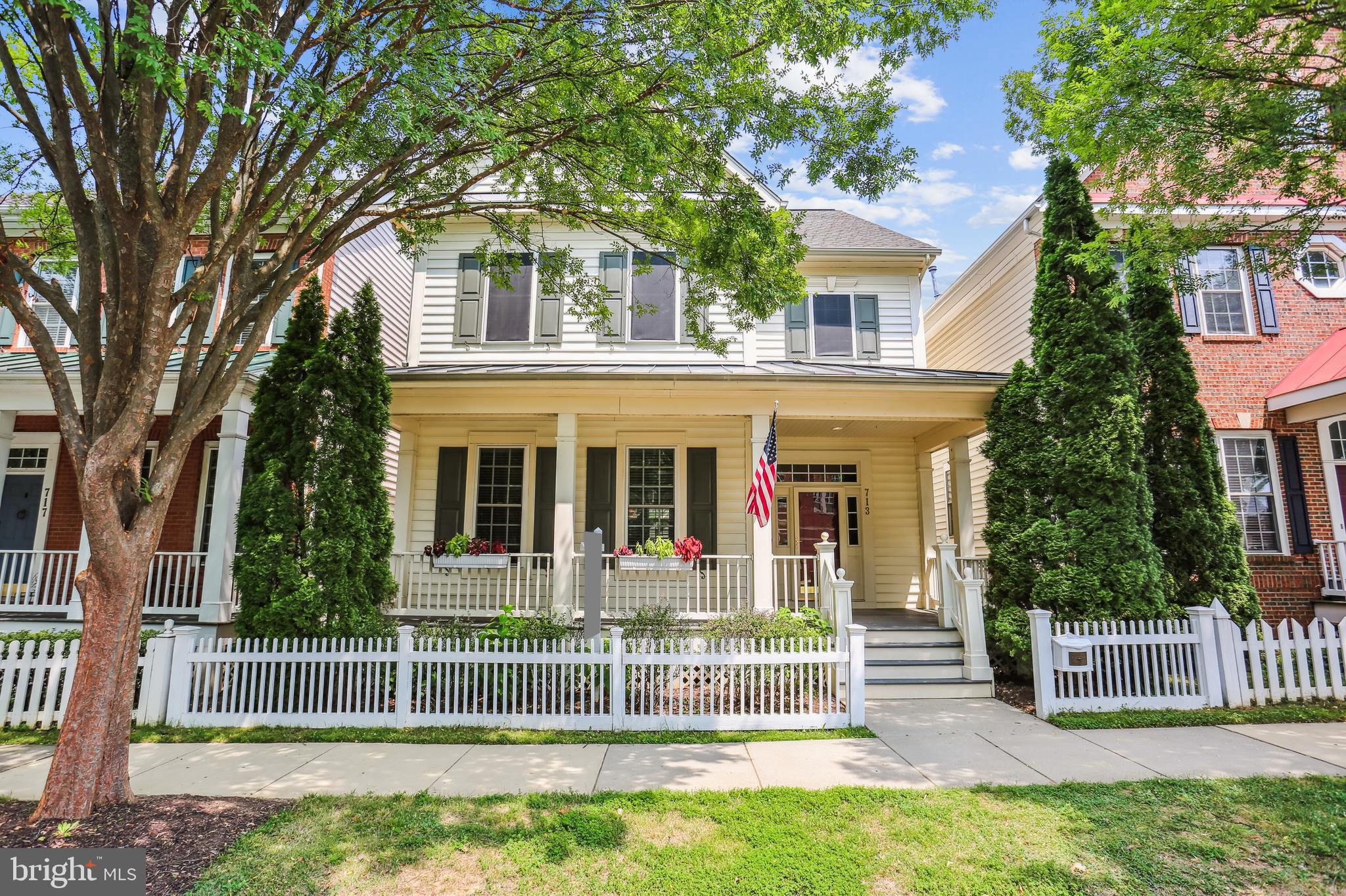 Spacious and bright home in a terrific location in the highly sought-after Lakelands! A welcoming wraparound front porch leads into a main level with large rooms and fantastic flow. The entry foyer opens to the large living room, with shutters and crown molding, and into the spacious formal dining room, featuring a tray ceiling, crown and chair molding, and wainscoting. The generous kitchen showcases Corian countertops, double ovens, a five-burner cooktop, and a large center island. The kitchen opens to the sunny breakfast area and a spacious, light-filled family room which features a gas burning fireplace and a ceiling fan. A pretty powder room, and mudroom/laundry room connecting to the deck and garage complete the main level. Upstairs, the luxurious primary suite boasts a double door entry, tray ceiling, crown molding, two walk-in closets, and a triple window overlooking the picturesque backyard. The spa-like en-suite bath features a double sink vanity, glass-enclosed shower, and a soaking tub. Three additional bedrooms offer generous space, each with crown molding and double-door closets. A second full bath completes the upper level. The finished lower level offers a large recreation area, a dual-entry full bath, a big bonus room, and a spacious storage room. Outside, a deck with a built-in bench and hot tub and a paver patio provide plenty of room for entertaining and relaxing. The two-car garage offers convenience and additional storage space. With its phenomenal location just moments from all of the shopping, dining, and entertainment options this sought-after neighborhood has to offer, this is a home you won’t want to miss!!