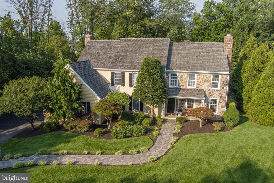 Welcome to 823 Avonwood Drive, a lovely 5 bedroom 4 bath home in the highly sought after Avonwood neighborhood and coveted Tredyffrin/Easttown School District.  Perhaps one of the best lots in Avonwood, the level property with a southwest exposure backs up to a lush row of trees providing privacy with space for entertaining and is extremely quiet.
As you step into the two-story entryway you will immediately be taken by the classic dining room with triple glass doors providing  views of your private deck and backyard.  Off to the right is a light filled formal living room with wood burning fireplace and a home office with lots of windows and access to the deck.
The stylish kitchen features white cabinetry and dark granite countertops and a Jenn-Air glass-top range.  The eating area is drenched in light on four sides with sliding doors to each deck and Velux Skylights.  The kitchen also looks out to the family room with a wood burning fireplace and a triple slider out to the deck.  The full bath and laundry room completes this floor.  The majority of the first floor features beautiful oak hardwood floors and most rooms have been freshly painted. 
The second floor features an enormous owner's suite which includes generous closets, a sitting room, a very spacious bath with skylights and a palladium window bringing in an abundance of sunlight.  Beautiful maple flooring runs throughout the owner's suite.  Three additional bedrooms, a full bath and a storage room complete this level.
The finished lower level offers an in-law/nanny suite with a large bedroom, full bathroom, walk-in closet and slider out to a brick paved patio and the backyard.  A media/gym area with daylight windows offers an additional space for gathering.  Hypoallergenic and eco-friendly cork flooring runs though out the lower level and overlays a radiant heating system.  Tons of storage space completes this level.
The property boasts a terrific location.  Easy access to all the major highways and train routes including Amtrak's Paoli station with direct service to NYC.  Shopping is divine with the legendary King of Prussia Mall,  the King of Prussia Towne Center and the specialty grocers of DiBruno Brothers, Whole Foods, Wayne Farmer's Market and Trader Joe's.   Excellent dining spots abound.  New Eagle Elementary is just a quick walk away.  Outdoor activities are just as impressive with the nearby Chester Valley Trail and Valley Forge National Park offering spaces for walks, hikes, bike rides and even fishing.  One  can even sharpen their game at the recently opened TopGolf.
Don't miss this very special opportunity!