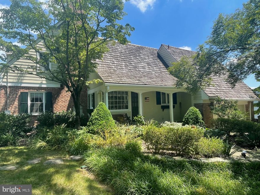 Price just reduced 100K! Welcome to this classic colonial featuring five bedrooms, five and one-half bath home located opposite the entrance to Burning Tree Country Club.   While it appears deceptively modest in appearance, it is light, bright, and airy, and features a multitude of formal and casual spaces for gathering, relaxing, and entertaining. 

The circular drive leads to a recessed front door and gracious entrance. The formal dining room has French doors to the upper patio. The formal, full length living room with wood-burning fireplace has glass doors to the upper porch. A wood paneled study with built-in bookshelves overlooks the Sylvan pool. A family room/den has a wet bar, wood-burning fireplace, and built-ins. The kitchen has engineered stone counters, a brick-faced alcove, and a separate eating area. 

On the upper level, the primary bedroom suite includes a wood-burning fireplace, a “hers“ full bath and dressing room with 10’ closet , a “his“ full bath and walk-in closet, and glass door access to a house-top balcony with sweeping view.  Four additional bedrooms and 2 full baths complete the second level.

A wood-burning fireplace and a wet bar anchor 1700 square feet of entertainment space, which includes a full bath and bonus room with closet in the lower level.  Glass doors lead to the lower patio and pool.