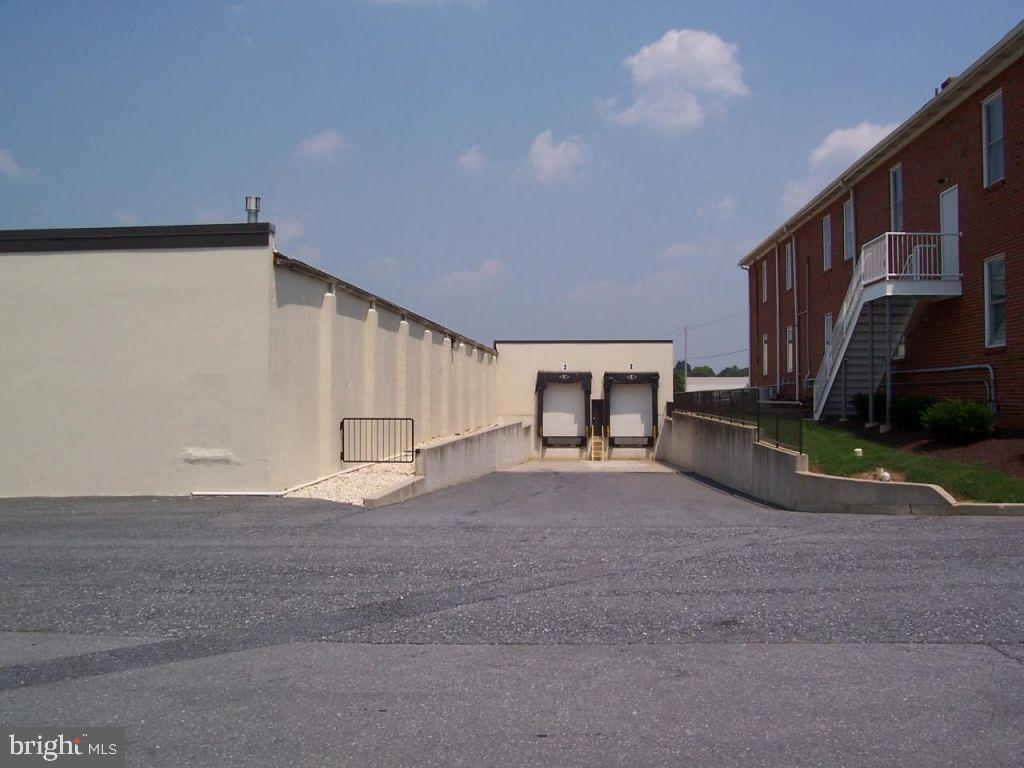 3572 sq. ft. Sprinkler, Heated, light mfg or distribution area w/14 ft. clear span ceiling, floor drain, approx. 120 sq.ft. Office. Walk-in Entrance Door & drive-in door from common area. Access to 2 loading docks. 3500 sq.ft of contiguous space available w/restroom & larger office area, see ML#237737. Both spaces, 7072 SF available at ML#225318. 36-Month Lease.