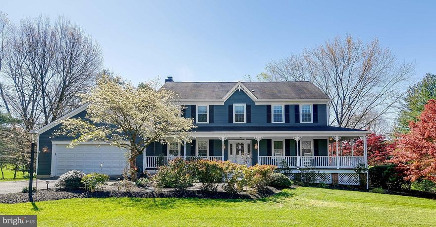 This beautiful, updated 4 bedroom, 3 bath colonial nestled on 2.08 acres has had many upgrades both inside and outside. The newly painted wrap around porch and landscaped exterior welcomes your guests and gives you a wonderful place to sit and relax. An apple tree, pear tree and Japanese red maple are found over the 2+ acres providing a stunning visual in both spring and fall. There are also older gorgeous, large trees that provide shade for the house and porch. Perennial flowers and bushes are planted in multiple beds around the property giving you that true country feel. The driveway has parking for an additional 4 cars and the siding was replaced with James Hardie Plank Siding that comes with a 50-year transferable guarantee. Open the front door into the two story foyer with marble flooring, new lighting and crown molding. Hardwood floors will be found throughout the main level and a fireplace adorns the family room. The large updated kitchen has quartz counters, self-closing drawers, a large island and large marble sink. You will also find high end appliances, hands free faucet and skylights to let in natural light.  You will feel like you live in a tree house. A 15-light glass door leads to a recently constructed back deck with a 6-person covered spa. The home will continue to amaze you.  There is a large yard with a bridge that allows you to walk over the back creek. Need extra storage? There is a shed in the backyard, a gated storage area under the porch and two gated storage areas under the deck.  An invisible fence is installed around the entire property so your pets will be safely contained. You will find four large bedrooms and a laundry upstairs. The master has 2 walk-in closets and all bathrooms have been updated with new features. Additional updates  include new paint and hardware on both interior and exterior solid core doors, cable jacks, and remotely programmable security system and electric thermostat. Well pump, water filtration system and outdoor lights have also been replaced.The partially finished, level walk-out basement gives you the opportunity to make it your own. Currently, there is a partially finished rec room with doors that lead to a slate patio in the backyard, a finished office/workout room with cedar closet and a workshop with built in cabinetry. This home is turn key ready and waiting for a new family to move in and make memories together.