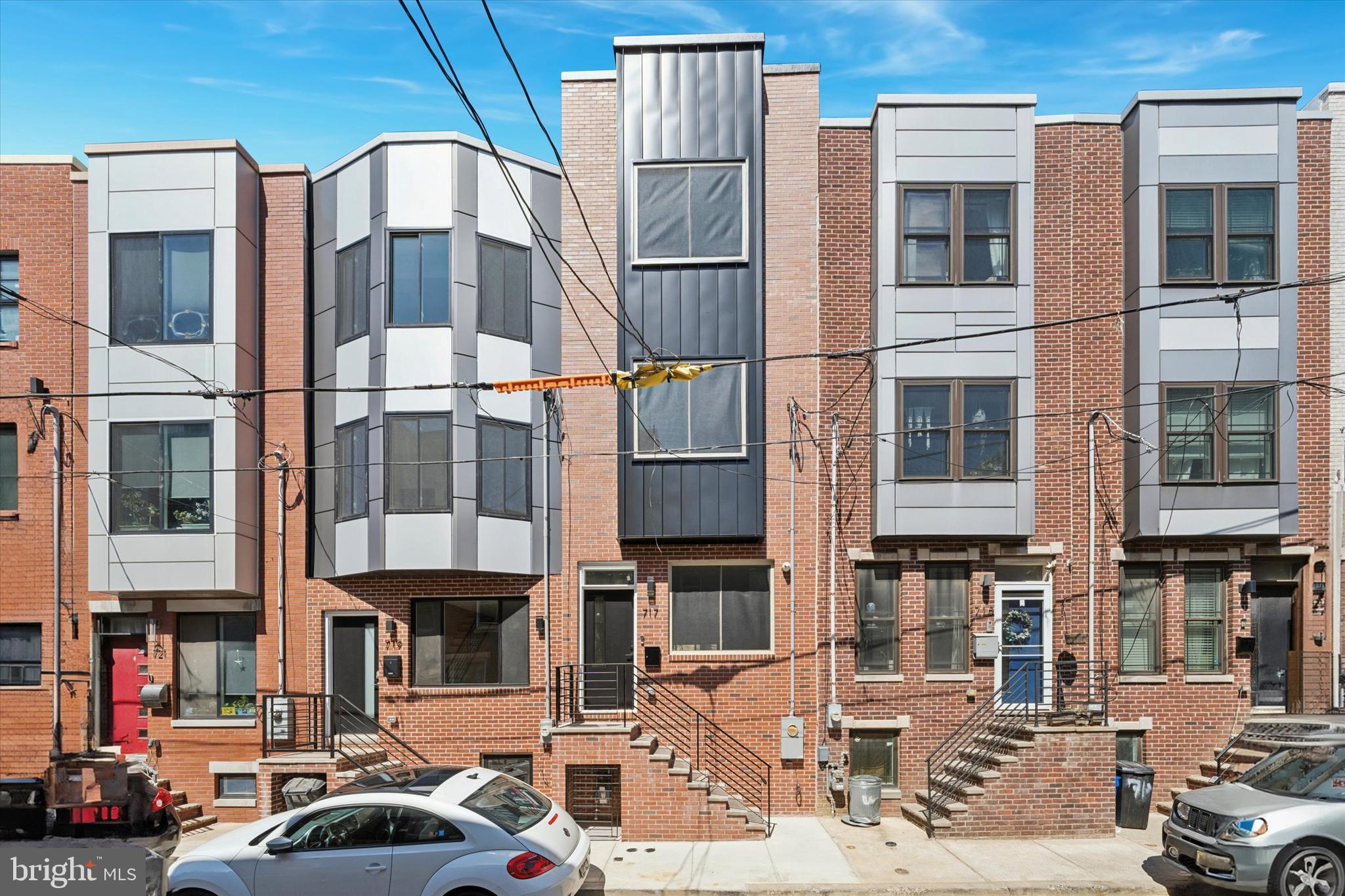 Welcome to 717 Mercy St , a stunning finished brand new construction home with 10 years abatement located in South Philadelphia’s East Passyunk Crossing. This gorgeous single family was constructed meticulously builder. Spanning just under 2000 square feet, this expansive 4-bedroom home boasts above-average amenities with 3 full bathrooms, an additional powder room, distinctive lighting packages, crown molding throughout, a wet bar on the 3rd floor, smart home Nest and Ring fixtures, along with built-in speakers and a security system. Enter the living room and take note of the generous width afforded by the 14-foot-wide property lot. Continue through the spacious dining area into the open concept gourmet kitchen featuring quartz countertops, a complete kitchen island, subway tile backsplash, and white shaker cabinetry including undermount cabinet lighting. The stainless steel GE appliances consist of a full dishwasher, oven range, double door refrigerator, . Step out back to appreciate the spacious rear patio with a 6 ft privacy fence and ample space for outdoor living and entertaining. The 2nd floor includes 2 full bedrooms, a full-sized stackable laundry closet, and a shared hallway bathroom featuring a soaking tub shower, quartz vanity top, and undermount sink. Ascend to the third floor to enjoy the expansive wet bar complete with glass tile backsplash, bar sink, and beverage fridge. Enter through impressive private owner’s suite, which consists of closets, crown molding, and accent tray lighting on the ceiling. The owner’s ensuite primary bath features an oversized stall shower and twin vanity undermount sinks with upgraded widespread faucets. Don’t overlook the 360-degree views from the 300+ square foot roof deck. From this side of South Philadelphia, you can see the stadiums, the bridges, and the skyline. Before you leave, be sure to visit the fully finished basement, which includes an additional full bathroom and under-stair storage closet. Arrange your tour today and ensure you seize the opportunity to own a piece of this thriving neighborhood in South Philadelphia!