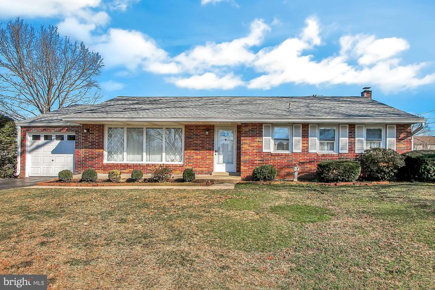 This is your chance to own a solid brick ranch home in an established neighborhood at a very reasonable price.  This great home has been well-maintained over many years and just needs a little updating to make it your own.  There are 3 nicely sized bedrooms and a full bath on the first floor, with a large living/dining area that is open to the kitchen with a breakfast bar.  Beautiful hardwood floors await underneath the first floor carpeting, and there are plenty of windows that keep the home bright.  There is also a full basement with outside access and a one-car attached garage.  You will also enjoy the flat usable backyard with covered deck for entertaining.  Other notable features include central air and a new roof (2013).  So set up your showing today, you will not be disappointed.