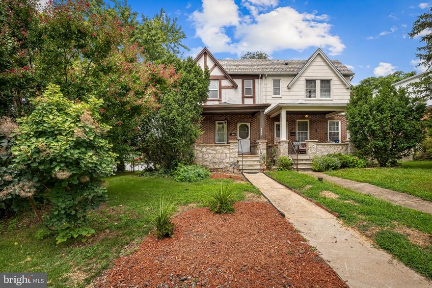This charming Tudor-style home in the desirable Beverly Hills neighborhood blends timeless character with thoughtful updates. Featuring 3 bedrooms and 2 full bathrooms, the home offers original hardwood floors throughout, a classic living room, and a formal dining room—perfect for gatherings and daily living. A partially finished basement provides flexible space that could serve as a recreation room, home office, or family room, offering additional comfort and utility. Numerous improvements have been made in recent years, including a new stove (2023), a new back roof with updated plywood (2023), and a newer slate roof on the front. The main bathroom was updated with a Bathfitter bathtub and surround, including new drywall and PVC plumbing (2023). The boiler received repair work in 2023, and the galvanized water line from the street to the home was replaced in 2024, ensuring improved functionality and peace of mind. A detached garage is located at the rear of the property and is being sold AS IS. This property offers the perfect mix of old-world charm and modern convenience in a walk-able, tree-lined neighborhood.