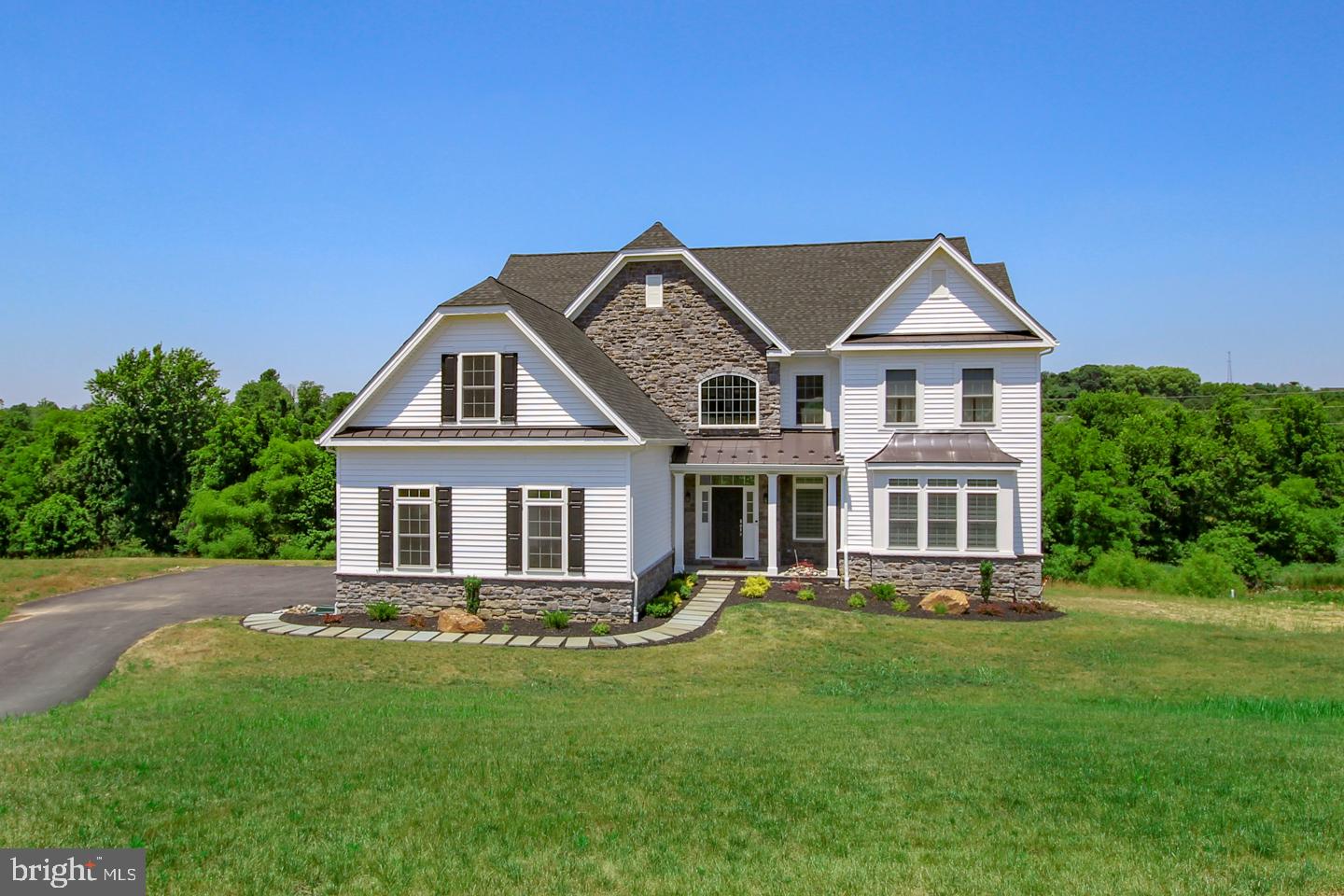 Darlington Pointe is expanding to include 7 new construction home sites built with care by Mar-J Builders, a family run business with pride in craftsmanship and over 25 years experience in construction. The Waterford I Model is a gorgeous center hall colonial with a bright, open floor plan, dramatic center hall entrance, oversized two story family room with floor to ceiling windows letting in natural light, gourmet kitchen with butler pantry and custom millwork throughout. A plethora of options for personalizing or expanding the model can convert this home from the standard 3,602 square foot, 4 bedroom, 2 1/2 bath to as large at 5,000 square feet with 5 bedrooms and 4 1/2 bathrooms. This community offers stunning wooded views, home sites with between 1 - 2 acres and is located in the heart of Middletown Township near local parks, schools, public library and Media Borough shops and restaurants. Close to route 1 and I-476 for access to all major roadways. Call the co-listing agent to set up an in-person or virtual appointment and learn more about our standard features. Options and pricing reflects an expanded family room, optional solarium, 5th bedroom and additional princess suite bath. Home price does not include homesite premiums which range from $50,000 - $60,000. Please visit DarlingtonPointe.com for more information!