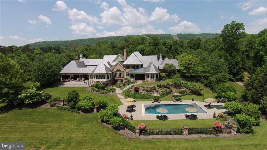 Customized luxury meets leisure at Campo Bella, architect Don Wayne Klinger. Tranquil English country oasis. Built by Heritage Builders. Casual elegance sprawls over 44+ acres with panoramic views of mountains and stream. Enter the gates to a private Shangri-La brimming with energy of memorable celebrations. Pristine condition - lush landscaping, courtyard, gardens, veranda covered porch. Tranquil treasures inside and out. The story continues in associated documents.