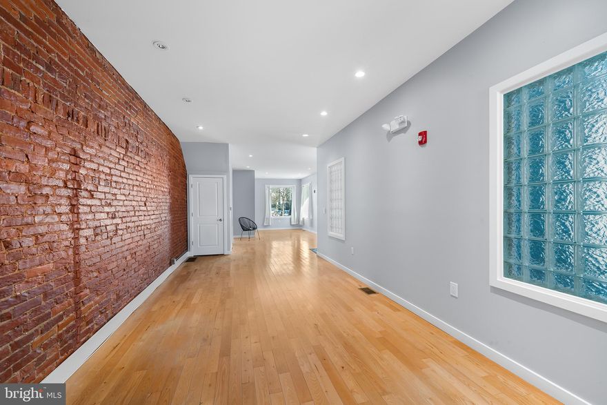 Welcome to this exceptional 3-story, multi-family corner property nestled in the vibrant heart of Fairmount. Offering a mix of charm and modern updates, this unique gem presents endless possibilities for investors and owner-occupiers alike. The 1st Floor Commercial Space has been recently renovated with a modern open layout, kitchenette, and powder room, this space is ideal for retail, office, healthcare or your creative endeavors. Additional finished space is located in the basement along with a kitchenette, full bathroom, and utility room. The 2nd fl rental unit is a chic 2-bedroom, 1-bath unit which boasts exposed brick walls, recessed lighting, and an open floor plan. This unit benefits from two additional bump outs and a private outdoor deck. The 3rd Fl Unit featuring two spacious bedrooms, one bath, and breathtaking Center City skyline views, this unit is a renter’s dream. This unit also includes a skylight and open staircase. The two apartments share a private entrance which also includes a coin operated washer and dryer. Situated in Fairmount, one of Philadelphia's most sought-after neighborhoods, 3000 Girard Ave is just steps away from world-class museums, cafes, restaurants, and public transportation. This property combines character, convenience, and versatility in one incredible package. Whether you're envisioning income-generating rentals, a live-work setup, or a standout addition to your portfolio, 3000 Girard Ave is the ultimate investment opportunity. Don’t miss your chance to own this Fairmount gem!