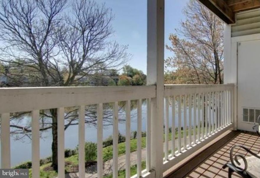 WON'T LAST LONG!  STUNNING LAKE VIEW CONDO!  Gorgeous Remodeled Kitchen with granite counters with breakfast bar, Maple 42" cabinets, stainless appliances, sink, pot rack and custom made stainless dining room set.  Ceramic tile floors in kitchen with Radiant heat.  Wood burning Fireplace.  Balcony overlooking lake and jogging trails. Close to METRO, Shopping, Golf, Parks, Recreation Center & Fun.