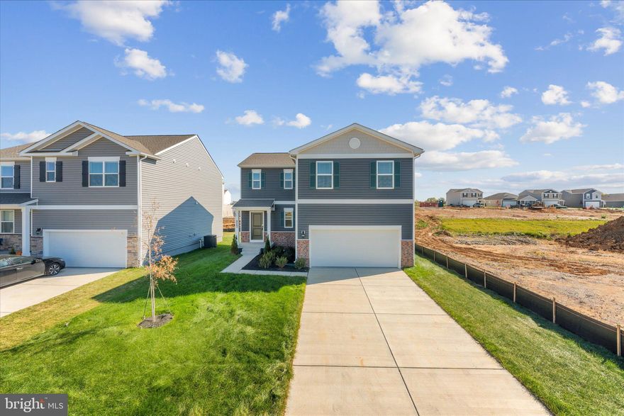 Discover a similar model at West Wind available for viewing before August 30th! This impressive Derby model home in Stephen City boasts 1,906 square feet across three levels, featuring four bedrooms and 2.5 baths. Enter through the front door or two-car garage into a spacious open floor plan adorned with stylish vinyl plank flooring. The gourmet kitchen is perfect for entertaining, equipped with a large island, Shaker cabinets, granite countertops, stainless steel appliances, and a pantry—all while offering stunning views of mountains and open fields. Plans for a large deck enhance outdoor living options.

Upstairs, the master suite includes a walk-in closet and a luxurious bath with a dual sink vanity and walk-in shower. Three additional bedrooms and a hall bath with another dual sink vanity provide ample space for family or guests, complemented by a convenient second-floor laundry. The walk-out basement features a large recreation room with beautiful views and extra storage.

Situated in the West Wind community, residents enjoy a playground and expansive green spaces, with easy access to highways 81, 66, and 340 for effortless commuting. This home blends style, functionality, and convenience—ideal for anyone looking to settle in Stephen City. Schedule a tour today and imagine making it your own!