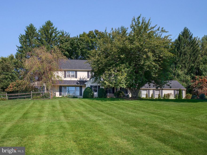 Perfectly positioned on a picturesque corner of a quiet cul-de-sac and set on over an acre of beautifully landscaped property, this exceptional home offers sweeping front-facing views of the 15th and 16th holes of the prestigious Waynesborough Country Club. From your front yard or through expansive windows, enjoy the rare luxury of watching the golf course’s annual fireworks display—twice a year—from the comfort of your own home.

A long driveway leads to a spacious two-car detached garage with ample room for additional parking—ideal for hosting gatherings or accommodating multiple vehicles. The backyard is fully fenced and offers complete privacy, enhanced by mature landscaping that surrounds the property and creates a peaceful, park-like setting. Whether lounging by the inviting pool, relaxing under the pergola, or enjoying the covered patio, the outdoor spaces are designed for comfort and entertaining.

Inside, a light-filled open foyer welcomes you into the home. The front living room is bright, spacious, and perfectly positioned to take in the stunning golf course views through oversized windows. Off the living room, a sun-drenched sunroom—currently used as a billiards room—opens to the rear covered porch, creating a wonderful indoor-outdoor flow. Also off the living room is a home office featuring custom built-ins and peaceful views of the backyard, ideal for remote work or creative pursuits.

The thoughtfully designed kitchen is both stylish and functional, featuring stainless steel appliances, quartzite countertops, and plenty of room for a large dining table. A gorgeous stacked-stone wood burning fireplace adds warmth and charm, making this space the heart of the home. The kitchen seamlessly connects to a generous dining room, ideal for entertaining, and a dedicated bar area, perfect for celebrations and casual evenings with friends.

Down the hall, the expansive great room offers a flexible layout with space for both cozy furniture and recreational activities. A first-floor bedroom with a large ensuite bathroom provides an ideal guest suite or in-law option. The main level also includes a powder room for guests and a spacious walk-in laundry room, conveniently located for everyday ease.

Upstairs, the owner’s suite is a true retreat with raised ceilings, abundant natural light, and an expansive custom walk-in closet offering exceptional storage and organization. The ensuite bathroom is elegantly appointed with double vanities, a soaking tub, and a large walk-in shower. Down the hall, another bright and comfortable bedroom with its own ensuite bath offers privacy and convenience. A unique two-story bedroom suite features a main-level living space and a lofted bedroom above, offering a creative and flexible layout. A recently updated hall bathroom serves the upper level.

Throughout the home, hardwood and tile floors add warmth, style, and durability. Every room in this property was designed with comfort, function, and beauty in mind.

This one-of-a-kind home combines an extraordinary location with thoughtful design, total privacy, and inviting outdoor spaces—making it the perfect retreat, just minutes from everything the Main Line has to offer.