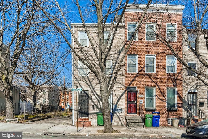 This charming Colonial townhouse, built in 1900 and effectively renovated in 2019, offers a prime investment opportunity in the vibrant Hollins Market neighborhood. With four spacious bedrooms and two full bathrooms, this property is designed for both comfort and functionality. The exterior features include classic brick construction, enhanced by exterior lighting and well-maintained sidewalks, contributing to the neighborhood's appeal. Investors will appreciate the modern appliances, including a built-in microwave, dishwasher, and gas range, which enhance the property's rental potential. The home boasts a mix of hardwood, laminated, and vinyl flooring, ensuring durability and ease of maintenance. The double-pane windows and skylights provide natural light while improving energy efficiency. Located in an urban setting, this property benefits from excellent transportation access, with an airport less than 10 miles away and a bus stop within a mile. The average condition of the property allows for immediate rental income, while the potential for appreciation in this sought-after area makes it a smart long-term investment. With on-street parking and a street view, this townhouse is positioned to attract a diverse range of tenants. The combination of location, modern amenities, and recent renovations positions this property as a lucrative addition to any real estate portfolio. Don't miss the chance to capitalize on this investment opportunity in a thriving community.  The home could be the ideal location for a transition home. Exit signs, interconnected smoke and carbon monoxide detectors are installed.  The MDE lead-free certificate is available.