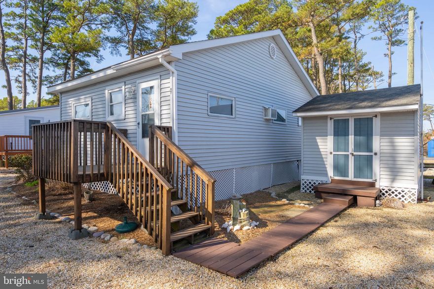 Tucked inside the waterfront community of Paradise Cove, this beautifully maintained home at 9 Oyster Road offers the perfect seasonal coastal escape (April through November) in one of Long Neck’s most affordable land-lease communities. Lovingly owned and meticulously cared for by the same owner its entire life, the pride of ownership is evident throughout, making this a truly move-in-ready opportunity.

Life in Paradise Cove (formerly Malones Bayside Marina) is all about simplicity, fun, and community. Enjoy on-site amenities including fire pits, picnic areas, and easy water access where you can fish and crab right off the dock. Boat slips are available for rent, making it effortless to get out on the bay whenever you want. Summer weekends come alive with live music at the local bait shop, and you’re just moments from Paradise Grill for waterfront dining and entertainment.

Whether you're looking for a relaxing getaway or a place to make lasting summer memories, this home offers an unbeatable combination of affordability, location, and lifestyle—plus some of the best neighbors around.