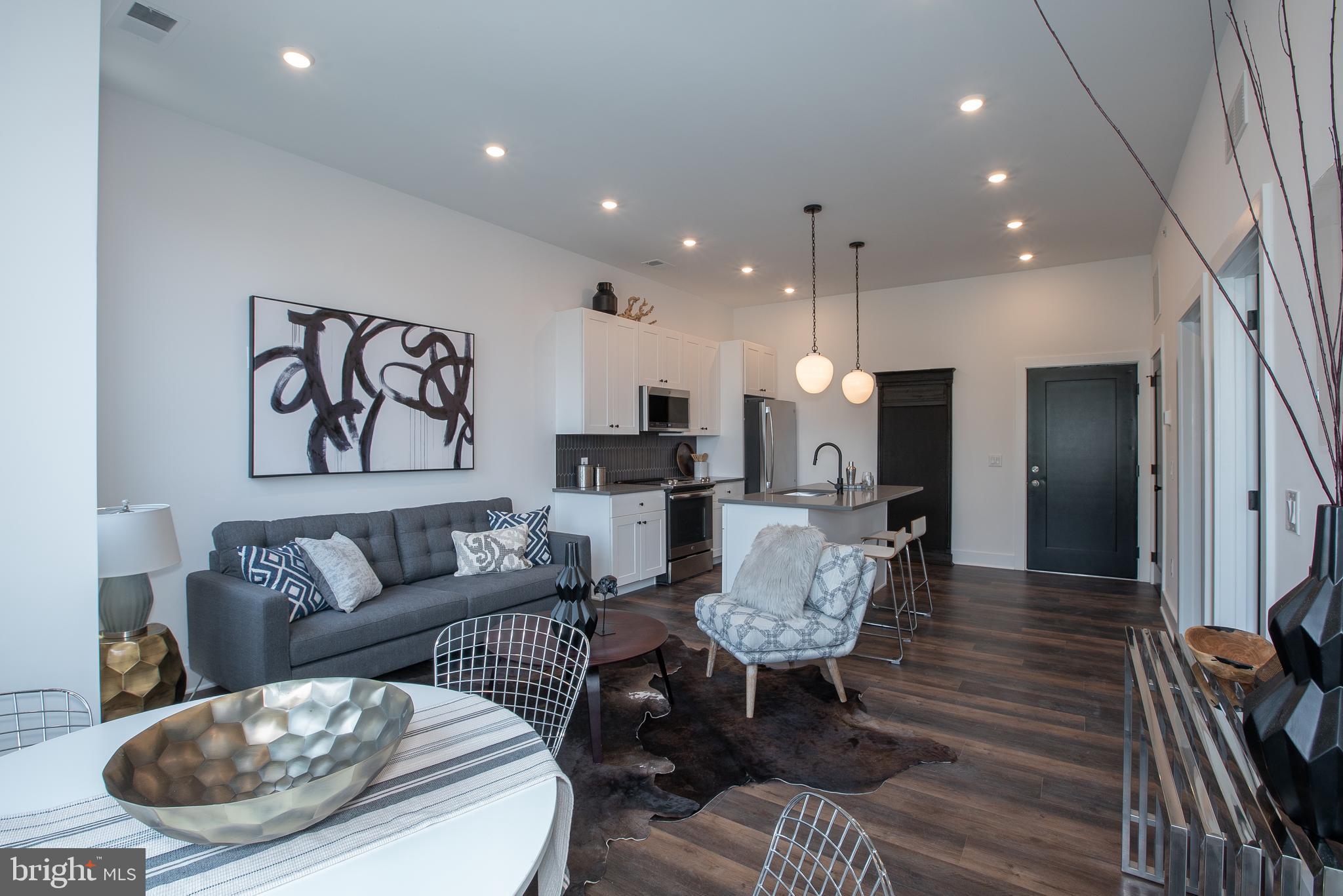 *Available Now!*

Welcome to The Porter, Brewerytown’s hottest apartment building just a few short blocks off bustling Girard Avenue and in close proximity to ALDI Supermarket and Fine Wine & Spirits. All Porter residents have access to see the center city skyline views from the uniquely designed, fully furnished rooftop deck! This spacious 1 bed, 1 bath apartment comes equipped with keyless entry systems, a breakfast bar with sleek grey countertops, modern 42-inch white shaker cabinetry, sleek matte black fixtures, high-end GE stainless appliances, black hexagon/black penny tiled floors, custom California styled built out closets, and a ton of natural lighting from the massive windows throughout. The Porter has a millennial lounge that is beautifully designed with a fireplace and a fully furnished workspace. All residents can enjoy the fitness center that is stocked with all of the top-of-the-line gym equipment you could ever need and limited on-site parking is also available for added convenience.

*Price reflects the net effective rent after a 1 month credit is applied to a 12 month lease at $1,500/mo. 
*Limited garage parking is available for an additional $150/mo fee.
*Pets permitted with owner approval. $250 non-refundable fee and $35/mo rent per pet required.
*Photos of a similar unit in the building. Finishes may vary.