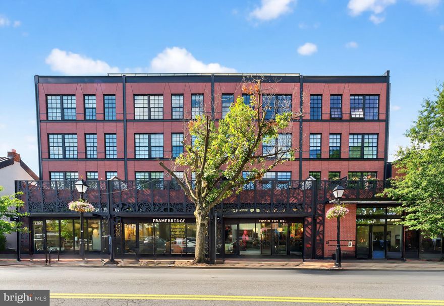 Discover refined urban living in this beautifully appointed two-bedroom, two-bath condo at The Braystone. Oversized windows fill the open-concept layout with natural light, highlighting the wood floors throughout. The fully updated kitchen features high-end appliances, offering both functionality and style. The primary suite is a serene retreat with a luxurious en-suite bath and spacious walk-in closet. Additional conveniences include an in-unit washer and dryer, garage parking, secure bike storage, and access to a rooftop terrace with panoramic views—perfect for relaxation or entertaining. This home combines elegance, comfort, and practicality in a truly exceptional location. Whether you are an investor or are looking for a great place to live, you've found it!  Assigned parking space #22.