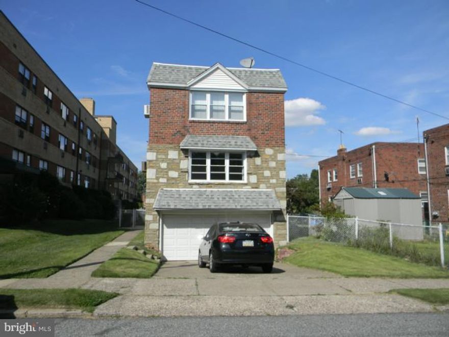 Rarely offered! Great Location! Large, single duplex with a two car garage and spacious fenced in back yard. Both units are bright and roomy with high ceilings. The first floor unit has two bedrooms,living room and a dining space.  The kitchen has lots of cabinets and counter space. The bathroom has been completely renovated.  The second floor unit has been completely gutted and renovated featuring a beautiful open kitchen with tiled counter tops, lots of wooden cabinets and modern light fixtures. The gorgeous bathroom comes with tiled floor and walls, new light fixtures, new vanity, and luxurious spa tub. There is bonus space with a powder room in the basement that could make a nice office. This property is great for owner occupied investors or regular investors. Don't delay. Schedule your showing today.