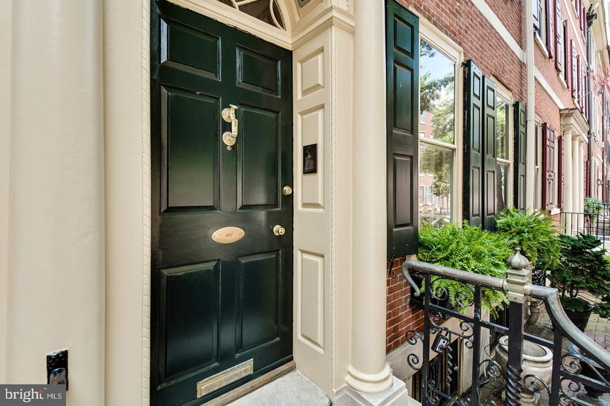Make this classic Philadelphia town house your next residence, and you will never want to move again. Merging the best of both worlds into one home. Outside you have the traditional facade of a stately town house, and then open the doors, to a breath taking, custom and contemporary master piece. The layout is an adult entertainers dream. Visually striking... upon your entrance, one can see the entire length of the home. Everything has been opened and is light filled. With finished on site hardwoods through out the home.... Every inch of the space is flexible.  Begging to be used anyway the new owner wished to live in it. First floor has a gigantic Living room that over looks the lower level Great room that is the true heart of the home. Rear of the first level has a light flooded Gallery, with enormous sky lights and custom build outs, that you can showcase your collections also a flex room that could be a formal Dining room, Music room or office with HUGE window that showcases the outside garden/parking. Lower level boasts a truly custom Chef's quality Bulthaup Kitchen with stainless and stone counter tops,  Sub-Zero refrigerator,  6 burner with grill  Viking range and double oven , Gaggenau freezer & wine fridge,  Miele dishwasher and trash compactor. Then on to the 2 story fireplace Dining room and a cozy family room with a half bath. 2nd floor its the master suite,  showcasing two traditional mantel surrounds on the fire places, Spa quality bathroom and Laundry room on the floor. Then next level has the private, 2nd bedroom with a full hallway bath, another 2 story great room/family room with fire place offering a full wet bar with fridge and ice maker. Then the 3rd bedroom tucked away in the dormer. This home is a "smart house" that you can control almost everything via your phone App. Don't miss this exceptional house in Society hill. The convenience, lifestyle and location cannot be duplicated.