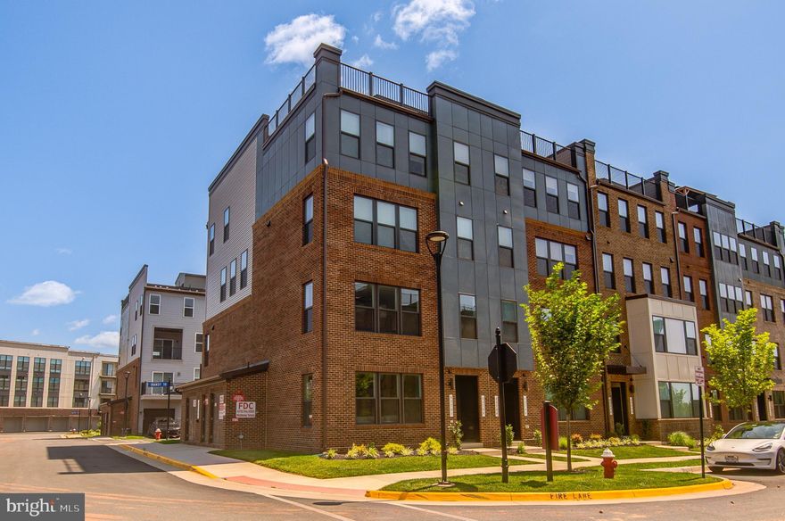 AS FRESH AS NEW!!! 2024 built, one year young home!! END CORNER, Lower 2 levels (First & Second level), stacked, townhome style CONDO at Ashburn Station Sub-Division! An exceptional location! Interior finished 1668 sq ft equipped w/3 bedrms, 2 full baths, & 1 half bath; 72 sq ft balcony & 1 rear car garage w/opener + 1 driveway parking. Ample guest parking spaces available at the sub-division streets <br> <br> The best choice for townhome style condo within walking distance of Ashburn Metro, shops, dining, & entertainment | Perfectly situated within 1 mile of the Silver Line’s Ashburn Metro Station, Dulles International Airport, the region’s very best access to major employers, & everyday conveniences | Just minutes away to SHOPPES @ RYAN PARK, LOUDOUN STATION, & BROADLANDS MARKETPLACE/SOUTHERN WALK PLAZA that feature over a dozen restaurants, boutiques, & neighborhood services | Wide tree-lined sidewalks provide a peaceful way to explore the area, whether getting  steps in or walking the dog | Access to major commuter routes like Loudoun County Pkwy, 267 Greenway/Toll, Ashburn Village Blvd & Waxpool Rd <br> <br> Water, sewer, lawn mowing, & mulching is included in HOA/Condo fee <br> <br> STANLEY MARTIN Homes built, TESSA floorplan, an open layout that allows light to flow through the entire area, an appealing sophisticated, modern design where comfort & convenience merge seamlessly; designed to be both practical & stylish <br> <br> Ample recessed lights thru out | Celing fans w/remotes | Ceiling fan pre wires <br> <br>  First level has gorgeous freshly installed LVP floors. Open living, cozy eating area, a humongous kitchen w/tile backsplash, quartz counters, & a long breakfast island, a pantry, coat closet, powder rm, & an acess to the garage off of the kitchen complete the first level | Second level is equipped with truly luxurious owner's suite featuring a spacious bathrm w/double bowl vanity, walk-in-shower, & a private water closet. Two large walk-in closets for plenty of storage space. Two secondary bedrms that share a hall bath, a stacked washer & dryer, an acess to the balcony from one of the secondary bedrms, & the mechanical area complete the bedrm level <br> <br> Amenities for year-round entertainment are available onsite: Current & soon-to-come amenities for meeting up w/neighbors, friends, & family; access to bocce court, playgrounds, an outdoor fitness area, firepit, gas grills, outdoor seating at several locations, as well as a bus stop serving Ashburn Metro Station every 10 minutes during weekday rush <br> <br> Numerous options for groceries: Harris Teeter, Lotte , Giant, & more....independent groceries | Pharmacies: CVS & Walgreens | Home Depot, nearby Parks, Lifetime Fitness, the W&OD trail, One Loudoun’s Top Golf, 1757 Golf Club & more <br> <br> Excellence in style, function & location