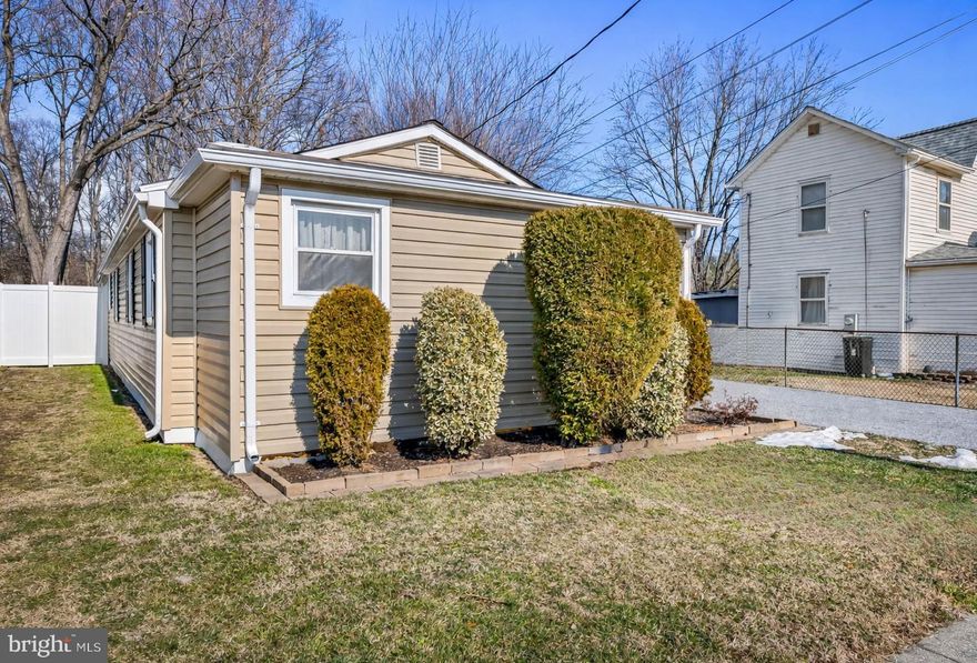 Discover the charm of 2519 Sycamore Avenue, a move-in ready rancher in Sparrows Point. This home features 3 bedrooms and 2 full bathrooms, offering easy one-level living. The spacious living room leads to an eat-in kitchen with white shaker cabinets, stainless steel appliances, granite countertops, and space for casual dining. The kitchen opens to a rear deck, ideal for entertaining or relaxing outdoors. Outside, enjoy a large, fully fenced yard with a generously sized, detached building complete with electric and built-in shelving. A spacious driveway provides ample off-street parking. Conveniently located in Sparrows Point, with easy access to walkways leading to both SPHS/MS and North Point Park. Enjoy nearby marinas, waterfront parks, and recreation areas along the Chesapeake Bay. Commuters will appreciate the proximity to major routes and BWI airport. Nearby shopping, dining, and everyday conveniences make this an appealing place to call home.