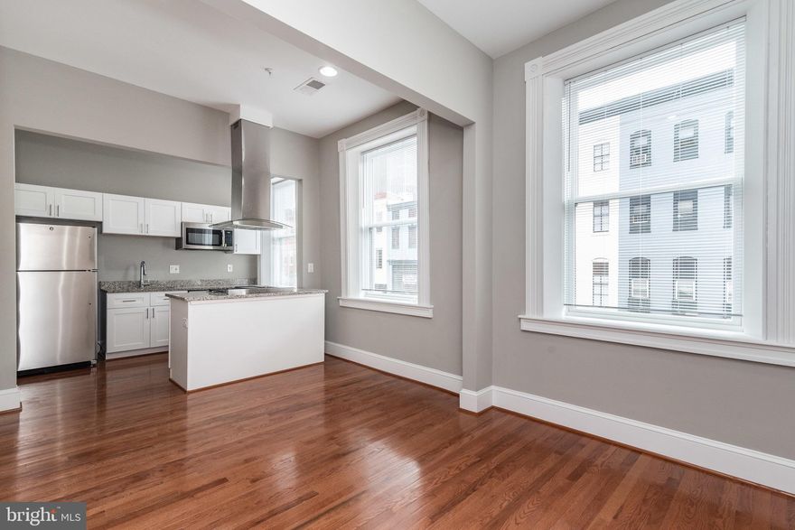 108 W. Saratoga features recently renovated apartments with all the amenities such as hardwood floors, high end bathroom finishes, granite counters, stainless steel appliances, washer dryers in the unit, central AC and more. The building is wired for cable/internet and ready for Comcast to hook you up. This apartment, Unit seven is a 2 bed 1 bath on the top floor overlooking Saratoga street. It has an abundance of natural light. There is one off street parking spot available for an extra $100 a month. Don't miss it!