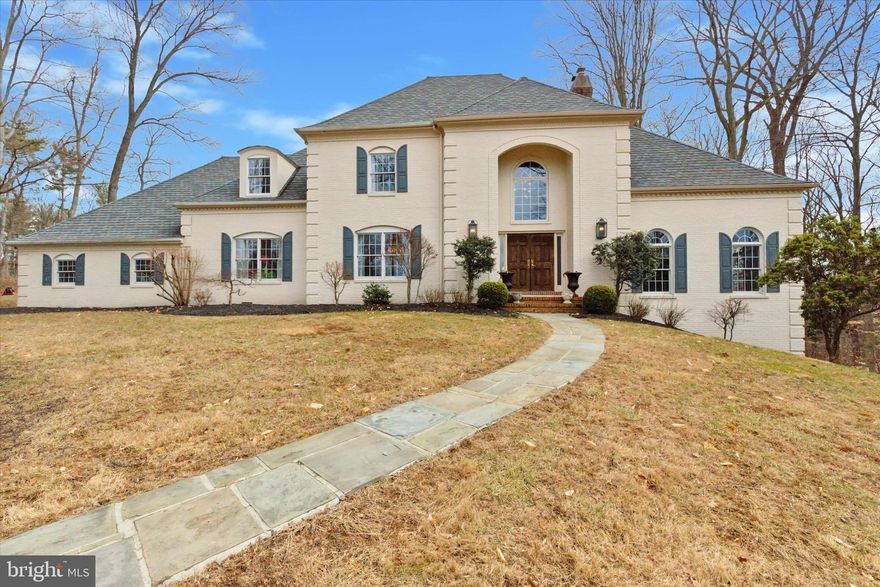 An unparalleled opportunity to own a coveted 2.3-acre property surrounded by an oasis of open space, woodlands, and meadows within Ridley Creek State Park. This impressive brick-front French Providential home is minutes from shopping and dining in Ellis Preserve and situated at the end of a quiet cul-de-sac surrounded by nature, offering ultimate privacy and breathtaking views. The property has undergone over $300K+ in professional renovations, including a fully finished walk-out basement and a completely reimagined private backyard with stunning views of the creek below, play areas for children, an English garden, firepit and a small orchard.
 
A grand entrance awaits featuring a two-story foyer and striking curved staircase and arched rotunda. The interiors have been outfitted with designer fixtures and expertly appointed finishes, blending classic elegance with modern updates. The home has hardwood floors throughout and the formal living room has one of two large fireplaces within the home, custom moldings, and large French windows, with French doors opening to a bright sunroom—an all-glass retreat perfect for sitting amongst the trees with panoramic views and access to the deck.
 
The formal dining room has elegant crown molding and leads to a spacious eat-in kitchen with views of the backyard and family room which includes the second of two wood burning fireplaces featured in the home making it ideal for both intimate gatherings and larger entertaining. 
 
The first floor also includes a private guest room with ensuite off of the mudroom. 
 
Upstairs are four additional bedrooms including the luxurious Master Suite which is a true retreat offering a private Juliette balcony, gorgeous views of the backyard, a dressing area, and two walk-in closets. The second guest room includes a vaulted ceiling, third story loft and hidden cedar closet for flexible storage, an additional home office, reading nook, crafting space or game room for children. The third and fourth upstairs bedrooms share a full bath, while the fourth bedroom features its own ensuite with built in desk and includes three walk-in closets of which one surrounds the perimeter of the room. 
 
The completely finished walkout basement adds even more living space, featuring a kitchenette, wine fridge, extra refrigerator, and versatile recreation areas. The private driveway and end-of-cul-de-sac location provide an added sense of seclusion, while the large deck offers breathtaking lookout views with a firepit over Ridley Creek State Park—a haven for rare songbirds in North America. 
 
Additional features include three of the five bedrooms feature ensuites, a first floor mudroom/laundry, a large wrap around closet on the second story, 3rd story cedar closet, loft and access to the 3-car garage
 
Recent Renovations & Updates:
New Roof (2018)
Newly dug 500 Ft. Well (2018)
English Garden for pollinators and orchard (2024)- Nectarine, Pears, Apple and Paw-Paw Trees
Newly poured concrete pad under deck, replaced all wood support pillars and Replaced all deck planks and trellis (2024)
New Visual Comfort lighting & fixtures throughout (including master bedroom & guest room) 
Interior & exterior brick painting
Fully renovated 2nd story guest bathroom
Repainted kitchen cabinets, new backsplash & appliances (2019)
Finished basement (added kitchenette, wine fridge, extra refrigerator - 2019)
New boiler gauge (2024) & Biannual Service Agreements
Professional front yard exterior landscaping (2023)
Professional backyard landscape architect & grading (2020) – natural stone retaining walls, walkways, native plantings and trees, water feature and firepit
 
This rare and stunning retreat offers the perfect balance of peaceful living and modern convenience, just minutes from the growing shopping and dining scene of Newtown Square. A true gem in the highly regarded Rose Tree Media School District and central to numerous private schools, this exceptional home is a must-see!