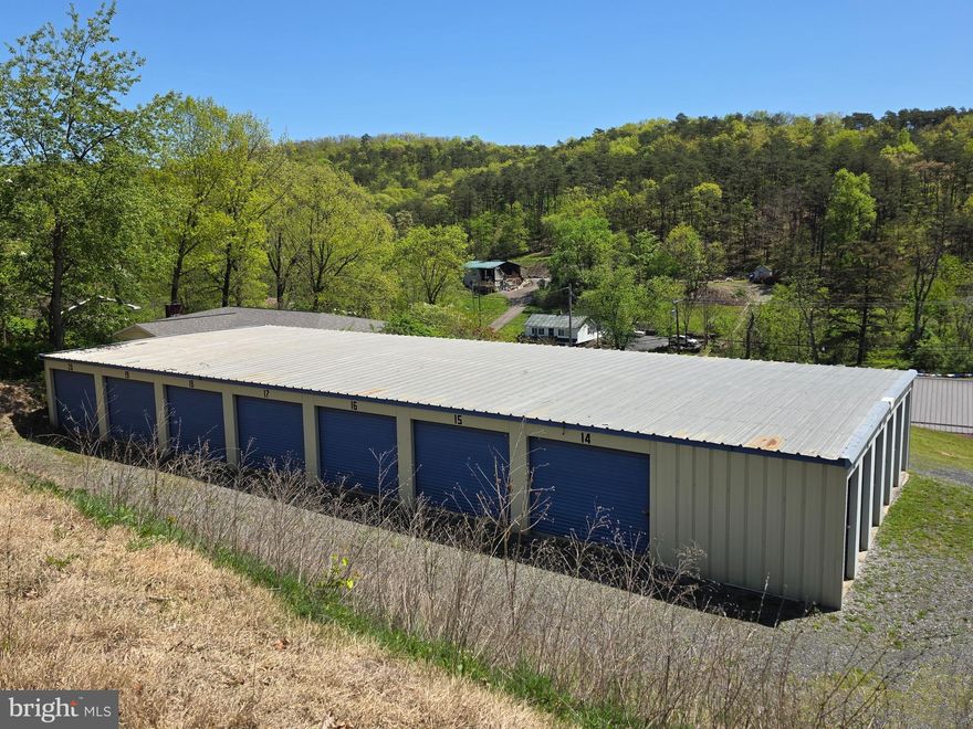 Turnkey income-generating property in the heart of Short Gap! This storage facility includes 20 units in a range of popular sizes. 
All units are currently rented, ensuring immediate cash flow. With high demand for storage in the area, this is a solid, low maintenance investment opportunity. Perfect for both new and seasoned investors looking to expand their portfolio with a reliable asset.