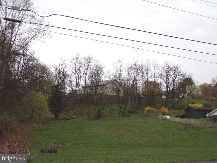 Lot is located on Country Club Road.   Outside of City Limits - No City Taxes.   All utilities available.   Close to all amentities.