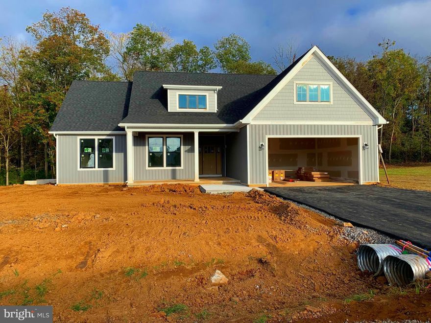 UNDER CONSTRUCTION IN UPSCALE NEIGHBORHOOD ON A 0.54 ACRE PREMIUM LOT BACKING TO TREES AND PRIVATE ACREAGE. COMPLETION ANTICIPATED EARLY DECEMBER. Open floor plan four bedroom 2 bath rancher on a full basement with two car garage. Features include: Large Great Room / Kitchen with stainless steel appliances, granite counters and island /  Master Suite with walk in closet / Master Bath with Separate Tub and Ceramic Shower /  Full Basement with roughed in plumbing for a future full bath.