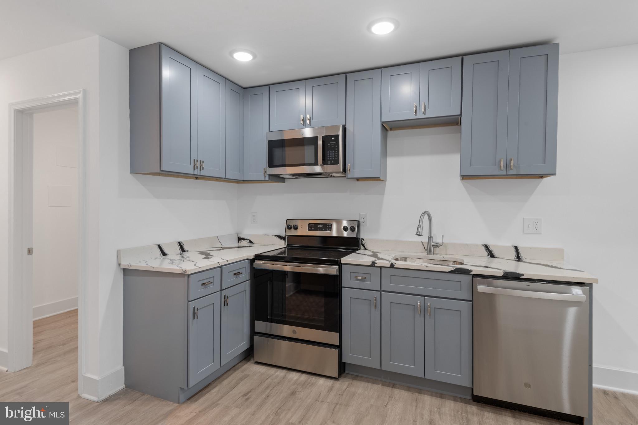 Fully renovated and thoughtfully designed, this beautiful home at 1007 N Mount St is located in the revitalizing Sandtown-Winchester neighborhood. Featuring 2 bedrooms, 2 full bathrooms, and a main-level half bath, the home offers a bright and functional layout ideal for modern living.
Enjoy a stylish kitchen with updated finishes and plenty of cabinet space, along with spacious bedrooms that provide a comfortable retreat. With access to $10,000 Vacant-to-Value grant for eligible buyers, this is an excellent opportunity to own in a growing community.