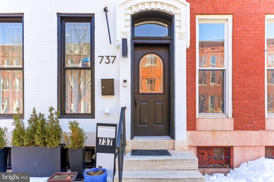 Welcome to 737 Dolphin Street, a fully renovated Baltimore rowhome offering the perfect blend of historic charm and modern functionality.

Completely renovated in 2020, this home features all new systems, roof, and major components, providing peace of mind alongside thoughtful design. The main level includes a light-filled living room, dedicated dining room, half bath, and a beautifully renovated kitchen with stainless steel appliances and updated finishes. The original staircase preserves the home’s character while complementing the contemporary updates throughout. The second level includes two guest bedrooms and an additional laundry/flex room that could serve as an office, gym, or additional lounge space.  The top level is dedicated to an expansive primary suite, offering a true retreat from the rest of the home. Enjoy a generous walk-in closet and a spacious en suite bath.

The fully finished lower level is configured as a studio apartment with its own private entrance, which is ideal for private guest quarters or as an income producing long-term rental, a mid-term furnished rental, or a legal short-term rental (if the upper levels are used as a primary residence). 

Outside, enjoy a fully fenced rear yard complete with a patio and rear deck, perfect for entertaining, relaxing, or creating your own urban oasis.

A turnkey home with modern upgrades offering flexibility and income potential!