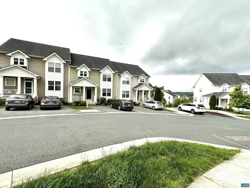 Very spacious 3,000+sqft Townhome located minutes from Charlottesville's Historic Downtown and convenient access to I-64. Escape from the daily pressures and enjoy the relaxing ambience created by the views of the Blue Ridge Mountain from the two decks one off the master suite complete with walk in closet as well a the main floor show stopping kitchen complete with granite countertop, tiled backsplash, maple cabinets you will find that this townhome with an amazing entrance starting with the double foyer that flows with an abundance of natural light and a first impression great for entertaining.  This Townhome offering endless opportunities as well as a large walkout finished basement featuring a home office.