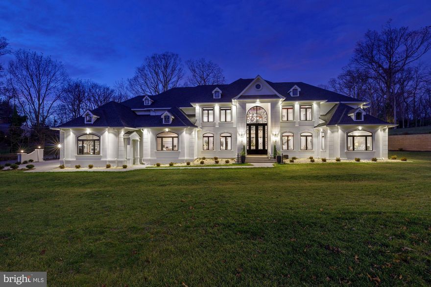 BEST VALUE IN MCLEAN! SUN-DRENCHED HIGH QUALITY LUXURIOUS TRANSITIONAL CUSTOM HOME with SUPERB finishes! Be prepared to enjoy the extraordinary lifestyle this property offers to anyone that passes through its gates! This exquisite almost 13,000 SQF Estate is a custom built with the whole family in mind. You are greeted by a prestigious gated entrance. The glamorous 18 FT custom designed iron door greets visitors with an impressive foyer, leading into an open floor plan. 
Bright and spacious high ceiling family room with a huge ceiling dome in family room and another in foyer.
Open and spacious floor plan with 10-ft ceiling on main level and basement, hosting gorgeous formal living and dining room and meticulous details throughout the home is perceptible. 
Double grandiose staircases, deluxe trim-work through-out the house, beautiful hardwood floor, elegant luxury chandelier lights everywhere. All bedrooms, family room dome, foyer dome, dining and living room have lighted tray ceilings.
The stunning gourmet kitchen is a chef’s dream with Wolf Range complemented by Wolf built-in oven and microwave, Wolf Coffee maker and Sub-Zero refrigerator appliances. Large Island and butler station with wine racks. The bonus 2nd kitchen is the cherry on the top!
Smart Built-in 6-Zone Sound System with 2 iPad controls in main and 2nd level. App based Built- in Security camera system (DVR) around the house and installed monitors in main and 2nd level. Smart App based garage and Gate opener. Smart fridge in 2nd kitchen, laundry hooked up  in each floor, 3 electric car outlet has been installed in the garage.
You have the freedom of choosing Master Bedroom in main or 2nd level. The Main level Master Bedroom features high ceiling, a lot of light, a fireplace, His/Her vanity and His/Her walk-in closet. For more convenient, there is 2 spacious powder room in main level and 2 in basement. Huge and elegant library with built-in shelves and wine fridge and fireplace.
2nd floor Master Bedroom has a spacious sitting area with a 2 -sided Fireplace, leads you to the luxurious bathroom. One of kind custom build His and Her closets! All rooms are large in size and have their own full bathroom and walk-in closets.
Flowing seamlessly from the main lever to 10 FT ceiling basement you would notice an impressive spacious and bright recreation room, Movie Theater, wine cellar, huge wet bar, exercise room (equipment are included), walking up to patio with built-in grill, perfect for entertainment. Allocated space for optional sauna to be installed, a ready to install elevator shaft and a huge charming fireplace, extra wide stairs lead you up to the backyard patio. It is a great place for entertainment and gas already hook up for fire pit. Perfect landscaping can be done on the upper backyard based on your test. Just imagine an impressive waterfall, a Gazebos and a fire pit up there!
High-efficiency triple zone HVAC units (Carrier), Extra capacity central vacuum, CertainTeed Landmark Pro Algae Resistant-AR roof shingles and 2 attic fan has been installed.  Generator ready home.
Perfect location in Mclean school district, with short distance to Tysons, shopping /retail of McLean and major commuter routes to Maryland and DC.
Rare Opportunity in this market for this price! There is NO house in this area with this SQF and THE LOOK!

Note: Still waiting on a few cabinets such as Wolf coffee maker area.