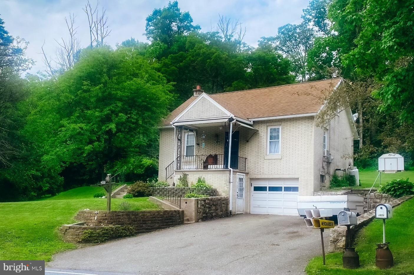 Check out this cute and cozy Muhlenberg Schools cape cod on a peaceful .42 acre lot. This home features a relaxing living room with a wood pellet stove to help with heating costs. Also featured on the first floor is a nice kitchen, 2 bedrooms, both with closets and ceiling fans, plus a full bathroom. Walk through the kitchen and up the stairs to the spacious second floor that would make a perfect main bedroom (currently a craft room/office) with an extra room that could be your walk-in closet, big enough for all your clothes and extra storage space as well. There is plenty of room and storage in the basement featuring the 1 car garage and a great workbench for all your projects. You have the perfect backyard with plenty of land that backs up to the woods allowing endless possibilities to make it your own private getaway.