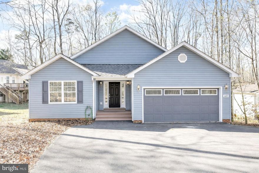 Welcome to this beautifully maintained home nestled in the desireable Lake of the Woods Community! This thoughtfully designed 3-bedroom, 2-bath residence features a fantastic floor plan with soaring vaulted ceilings and large windows that flood the home with natural light. Wood-look LVP flooring adds warmth and durability throughout the main living areas, while a cozy fireplace creates the perfect focal point for relaxing evenings.

Step outside to enjoy the expansive wraparound porch stretching across the back of the home — ideal for entertaining, morning coffee, or peaceful sunset views.

This vibrant lake community is perfect for full-time living or a weekend retreat, offering kayaking, boating, scenic walking trails, and engaging community events. Enjoy comfort, charm, and an active lifestyle all in one exceptional property.