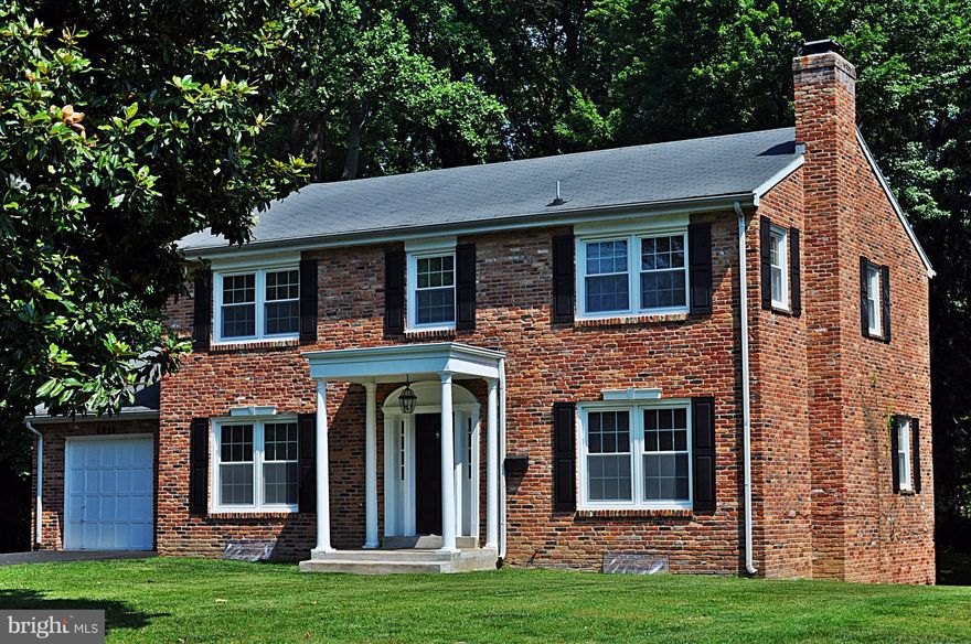 Stately brick Colonial on private wooded lot. Many updates: renovated eat-in kitchen, new windows, fresh paint, refinished HW floors, new driveway. Formal DR. 4 bedrooms & 2 baths on upper lvl.+ Study/5th br. on main. Family rm. opens to spacious deck. Finished LL w/ rec. room, den, laundry. Car garage. Excellent private & public schools. Landlord pays for mowing lawn. Fireplace non-operational.