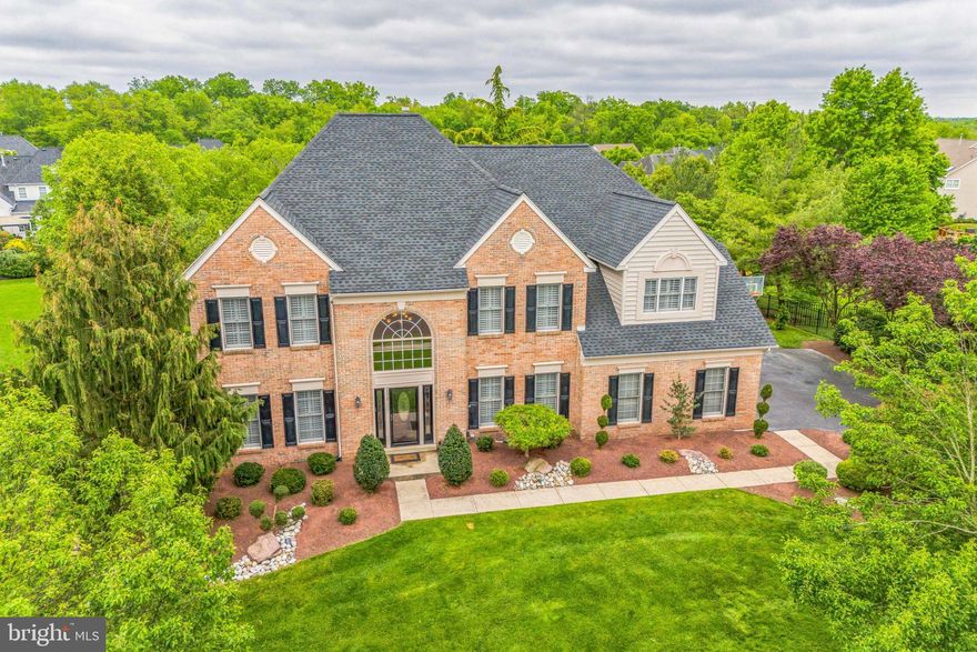 Indulge in luxury living at its finest with this exquisite estate home nestled in the prestigious Horsham Chase neighborhood. . Boasting over 5600 square feet of meticulously crafted living space, this home offers a blend of sophistication, comfort, and convenience. Step inside and be greeted by the grandeur of vaulted ceilings and an abundance of natural light cascading throughout the open floor plan. The heart of the home is the newly renovated gourmet kitchen, featuring an oversized granite island  with built in refrigerator drawers, granite counters with undercounter lighting, designer cabinets, and top-of-the-line stainless steel appliances, including double oven.  Entertain guests in style in the adjacent family room, complete with a custom, show stopper, floor to ceiling stone fireplace stone fireplace, or, at your custom wet bar boasting a built-in wine cooler and bespoke cabinet, all set against a sleek granite countertop and access to the semi-covered Trex deck, perfect for al fresco dining or relaxing evenings. Indulge in the epitome of luxury and relaxation in the master suite of this stunning estate. The vaulted ceilings extend seamlessly from the master bedroom into the spa-like master bath, creating an atmosphere of spaciousness and tranquility. Prepare to be pampered in the master bath, where every detail has been meticulously designed for comfort and convenience. Step onto the heated floors, a welcome luxury during the colder months, as you make your way to the centerpiece of the room: the Bain Ultra air jet bathtub. Sink into pure bliss as powerful jets soothe tired muscles, while the new skylight overhead bathes the room in natural light, creating a serene ambiance. Adjacent to the tub, you'll find a custom shower with independent settings for personalized comfort. With the push of a button, enjoy the perfect temperature and water pressure tailored to your preferences, whether you're seeking a gentle cascade or an invigorating spray. Stepping out of the tub, you'll find a heated towel rack for your convenience and comfort. But the indulgence doesn't stop there. Experience the ultimate in comfort with a heated toilet seat, adding an extra touch of luxury to your daily routine. This master bath is more than just a space for relaxation—it's a sanctuary, a place to escape the stresses of the day and rejuvenate both body and mind.
 All bedrooms have been updated to custom California closets for added elegance and organization. You'll also find a two zone Amana  HVAC system (2015), New roof (2021)with 10 year transferable warranty, a home alarm system with window and motion sensors, New Pella rear sliding door with built in blinds and a new designer Pella front door. Additional features abound, including a matching 17 x 12 house shed, custom plantation shutters throughout (excluding the garage), and a comprehensive home alarm system with window and motion sensors for peace of mind. Embrace natural light with a new Pella rear sliding door featuring built-in blinds, while a designer Pella front door makes a statement from the moment you arrive.
Descend into the 1600-square-foot finished basement, where entertainment awaits with surround sound, a versatile office/exercise room adorned with French doors, and a pool table for hours of enjoyment. Practical amenities include a sump pump with backup, 350 square feet of unfinished storage space, and recessed lighting throughout, all enhanced by a convenient half bath.
Located near major motor routes (611, 309, 202, and the PA Turnpike), commuting is a breeze, with Ft. Washington Train Station just 8 miles away and Philadelphia International Airport reachable in under an hour.