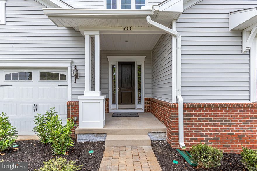 MODEL HOME FOR SALE! -- 55+ community ***Fabulous main-level living with open floorplan and 10-foot ceilings.  Large Ultra gourmet kitchen with walk-in pantry and huge over-sized island open to the great room and dining areas.  The kitchen includes upgraded stainless steel appliances, upgrade cabinets, pendants above the island, quartz countertops and engineered hardwood floors.   Enjoy entertaining or just relaxing in the great room area complete with dry bar and including engineered hardwood flooring. Primary bedroom includes an over-sized ultra seated shower, two separate vanities with upgrade cabinets, quartz countertops and 12 x 24 ceramic tile;  plus an enormous walk-in closet.  Spacious second bedroom also includes a walk-in closet.  Completing the first floor living space is a sizeable home office, a mud room and spacious laundry room with storage closet.   In the lower level the rec room is so large you have room for just about any activity imaginable -- especially with the level walkout doorway to the back yard.  Need a guest room?  There is another bedroom with extra large walk-in closet and a full bath.   Be sure to notice all of the finer decorator details that enhance this model home. This home has everything the active adult buyer is looking for.