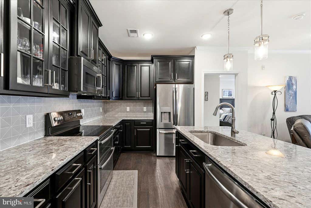 Photo of 23630 Havelock Walk Ter #305, ASHBURN, VA 20148 (MLS # VALO2134764)