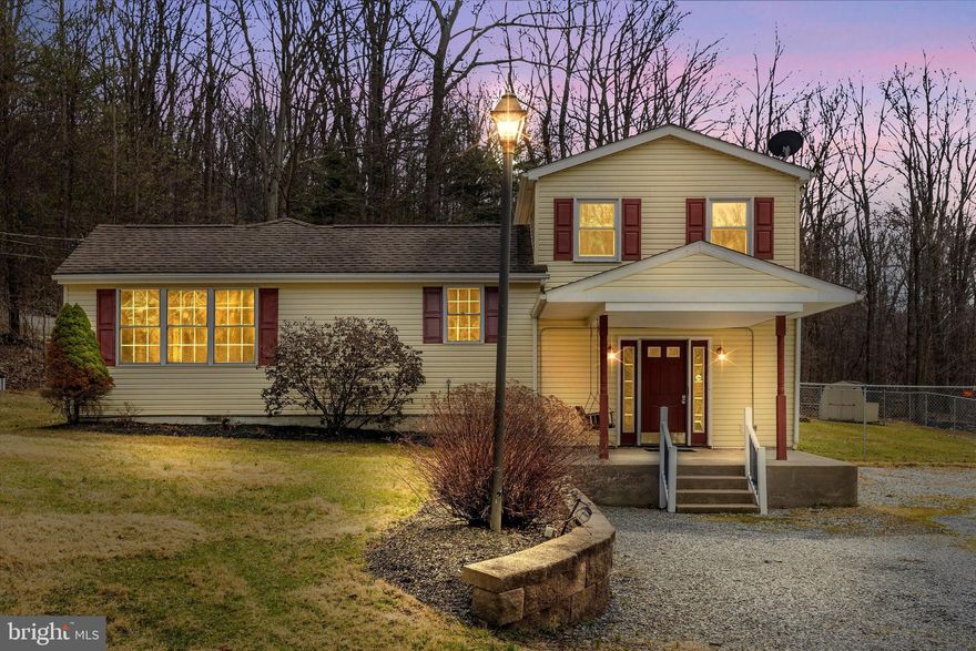 Escape to your own cozy woodland retreat at 4439 John Draper Rd, a charming home nestled among the trees, offering the perfect blend of comfort and nature. Whether you're looking for a peaceful weekend getaway or a full-time residence, this property provides a serene and inviting atmosphere. The spacious main level offers everything you need, including a warm and welcoming living room with gas fireplace, a well-equipped kitchen with updated appliances, a large island, and abundant cabinet space. The expansive dining room and family room provide plenty of space for gatherings, while two comfortable bedrooms and a full bath with laundry add convenience. The private upper level serves as a primary retreat, complete with its own bath, creating a tranquil space to unwind. Beautiful hardwood floors flow throughout the home, adding to its charm. Recent updates include a new HVAC system (2024) and a roof replacement in 2015 (previous owner) and freshly painted throughout. Step outside and enjoy the natural beauty surrounding this one-acre property. A custom paver patio, deck, and fenced rear yard create ideal spaces for outdoor relaxation, while the oversized shed with a garage door and an additional shed provide ample storage. The location is perfect for nature lovers, just minutes from Cunningham Falls and Catoctin Mountain Parks, offering endless opportunities for hiking, fishing, and exploring the great outdoors. If you're dreaming of a picturesque retreat where you can unwind and enjoy the beauty of nature, 4439 John Draper Rd is the perfect place to call home.