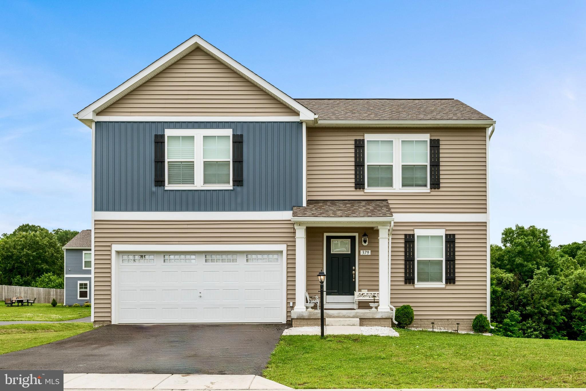Welcome to 379 Eurasian Drive—where modern convenience meets thoughtful upgrades in this beautifully maintained, move-in ready home just 3 years young! Ideally located in the desirable Morning Dove Estates community, you're minutes from commuter routes, shopping, dining, and only a short drive to both Winchester, VA and Martinsburg, WV.
This property features a fully finished walkout basement—complete with a full bathroom and access to the backyard that backs to protected HOA land, ensuring your peaceful view will never be developed. Enjoy the outdoors from your 14x12 maintenance-free composite deck, perfect for entertaining or quiet evenings.
Inside, you’ll find timeless style and modern finishes. The main level has luxury vinyl plank flooring, combining durability with beauty. The kitchen is a true showstopper with white cabinetry, quartz countertops, tile backsplash, and an oversized island with contrasting gray cabinetry that adds a designer touch. A versatile bonus room on the main level—paired with a convenient half bath—is perfect for an office, playroom, or guest space.
Upstairs offers four generously sized bedrooms, including a spacious primary suite with an ensuite bathroom and walk-in closet. All bathrooms feature upgraded gray cabinetry and tile shower inserts.
Additional highlights includes: all appliances convey, including washer and dryer, established neighborhood with sidewalks and a community feel, energy-efficient systems and peace of mind that comes with newer construction—without the wait. This is your chance to own a better-than-new home with premium upgrades already in place. Schedule your showing today!