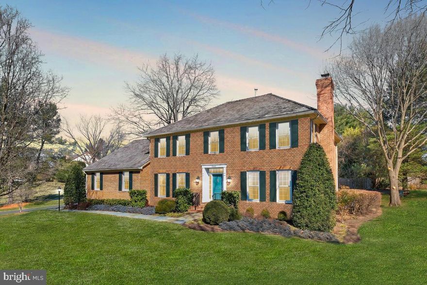 Fall in love with 13005 Boswell Court, nestled on a quiet cul-de-sac in one of Potomac’s most desirable communities on an expansive 2-acre lot. This beautifully presented 5,650-square-foot Cardinal model by Wakefield Homes showcases meticulous attention to detail, combining elegant finishes with modern amenities.
Numerous upgrades include a complete kitchen remodel (2012), new cedar shingle roof (2007), all bathrooms updated (2019), new furnace (2017), new HVAC (2017), new exterior railings (2023), and more! The private, beautifully landscaped backyard features a flagstone patio, perfect for both relaxing and entertaining.
Spanning three fully finished levels, this home boasts hardwood floors, extensive millwork, built-in bookshelves, recessed lighting, skylights, a screened porch, and a convenient mudroom/laundry room off the two-car garage.
At the heart of the home, the renovated eat-in kitchen is a chef’s dream, featuring a center island with a cooktop and breakfast bar, stainless steel appliances, granite countertops, crisp white cabinetry, and an oversized garden window that floods the space with natural light. The main level also offers a breakfast area, family room, formal living and dining rooms, private office, screened porch, mudroom, and powder room.
Upstairs, you’ll find four spacious bedrooms and three full bathrooms. The owner’s suite is a true retreat, featuring a sitting area, two walk-in closets, and a luxurious en-suite bathroom with a modern tile surround, glass panel shower, dual vanities, soaking tub, and skylight.
The lower level provides flexible living space with a large recreation room, full bath, finished bonus room, and a utility room with ample storage.
Ideally located with easy access to major commuter routes, this home is close to numerous parks, recreation options, and nationally rated golf courses—perfect for outdoor enthusiasts. Top-rated Montgomery County schools further enhance its appeal.
Don’t miss this incredible opportunity to own in one of the DC area’s most sought-after communities!