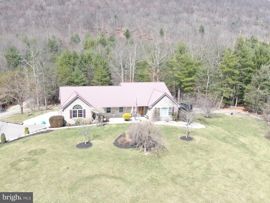 A DREAM HOME WAITING FOR YOU! Nestled on 4.76± private acres, this stunning 3-bedroom, 3.5-bathroom home offers the perfect blend of comfort and convenience. The spacious primary suite features a luxurious en suite bath with a soaking tub, walk-in shower, and large walk-in closet. Enjoy cozy evenings in the living room with a beautiful stone gas fireplace, entertain in the dining room, and cook with ease in the kitchen featuring hickory cabinets and a center island. Additional highlights include a foyer, laundry room, full basement, and a 2-car garage. Step outside to relax and unwind in your above-ground pool, all while being just minutes from Flintstone and Rt. 68. This property is truly a rare find—don't miss your chance to call it home! Solar panels are owned and the sellers have not had an electric bill in approx. 4 years! The solar panels generally produce a surplus of energy! This property will be offered at auction on Wednesday April 23, 2025 @ 3:00pm. The List price in no way represents a minimum, starting, or acceptable bid.