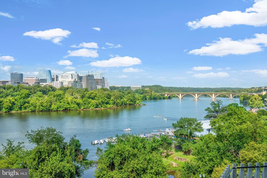 Eighth floor, corner unit with unobstructed views from every room of the Potomac River,  from Georgetown to the Memorial Bridge including the city of Arlington skyline! Completely renovated unit with 2Bedrooms/2 Baths +  half bath  with over 2600 SF.  Balcony and new floor-to-ceiling sliding door windows along the entire perimeter of the apartment to step out from each room. Luxuriously large foyer perfect for art and expansive Living Room includes wall of built-in bookshelves and bar. Additional sitting area perfect for an art gallery and room for a grand piano. The Dining Room sits affording views out of a corner wall of windows ideal for sunset viewing and waterfront activity. A library/office/den is off the chefs kitchen. The bright and spacious kitchen includes top of the line appliances, custom cabinetry and marble countertops. Washer/dryer in the unit.  Excellent storage throughout plus additional designated basement storage unit. Situated a few minutes walk to the Kennedy Center, the new Reach, Georgetown, the National Mall and river pathways. Watergate West also boasts a gym and outdoor pool with beautiful landscaped gardens. One assigned parking spot (rented at $300/month each) complete this spectacular offering. Parking is prepaid for 2 years.