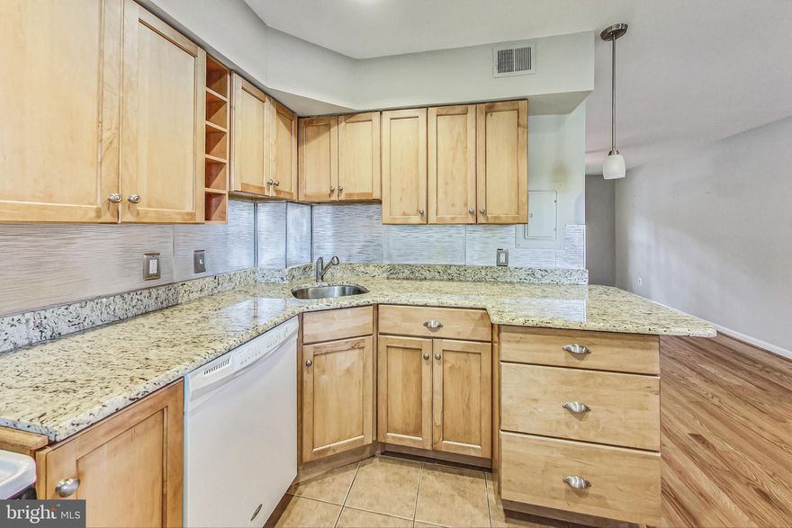 New Year New Price...Located on the Border of Bethesda & Silver Spring 2+1 TWO LEVEL - Great location for this updated townhome style condo -- 2 levels, Featuring CONVENIENCE and LOCATION Welcome to this UPDATED light and fresh -- kitchen with gas cooking, granite countertops and newer cabinets, updated bath and beautiful hardwood floors throughout. Main level features open plan with living room, dining area and kitchen. 2 nice sized bedrooms and full bath upstairs, laundry facility located on site [ not in unit] . Unassigned parking for 2 cars. close to Bus Line to SS METRO to BETHESDA, stroll to the FAMOUS ParkWay Deli, just off of east west highway. Water is included in the rent.