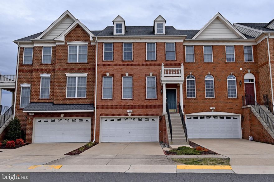 FABULOUS 2-CAR GARAGE TOWN HOME IN SOUTH RIDING!  HOME FEATURES HARDWOOD ON MAIN LEVEL, OPEN FLOOR PLAN W/EAT-IN KITCHEN THAT OPENS TO FAMILY ROOM W/GAS FIREPLACE.  KITCHEN HAS ALL STAINLESS APPLIANCES, GRANITE AND ISLAND.  UPPER LEVEL LAUNDRY, VOLUME CEILINGS, SPACIOUS BEDROOMS AND 2 FULL BATHS.  HUGE FINISHED REC ROOM IN BASEMENT.  AMAZING SOUTH RIDING AMENITIES AND A GOLF COURSE WITHIN THE COMMUNITY.  ONLY ONE SMALL DOG WILL BE CONSIDERED, NO CATS.  OLDER PHOTOS USED IN LISTING.