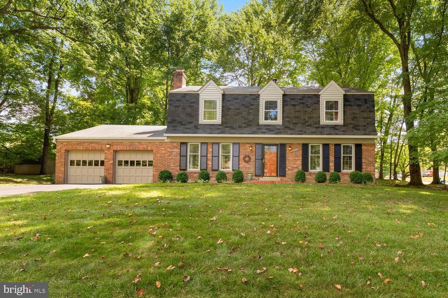 This one is a must see! Gleaming hardwood floors throughout the main and upper levels! Cozy brick wood burning fireplace in family room! Kitchen and breakfast room open to bright and spacious sun room! Living room, dining room, laundry room, and half bath complete the main level! Upper level features owner's suite with stunning updated bath, plus 3 additional bedrooms and updated full bath! Don't miss the incredible lower level! Huge rec room, bonus room, storage room, and full bath! Back patio looks over private, fenced yard! This one is awesome!