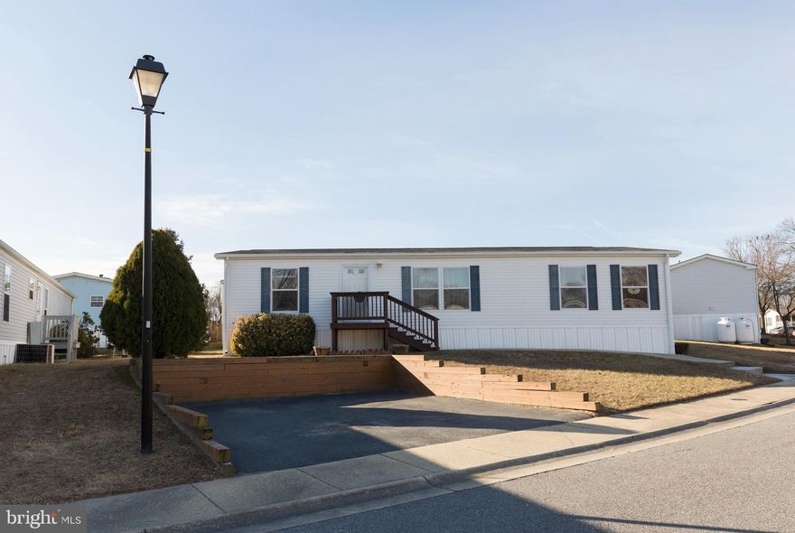 Just Listed! 3 Bed 2 bath 1344 sq ft  (28x48) mobile home in Brentwood Manor!  Large, open kitchen with breakfast bar island.  Open family room with vaulted ceilings. Primary suite with private full bathroom.  Spacious laundry room with extra storage. Great deck off the rear.  Commuter friendly to 95, 295 and 100.